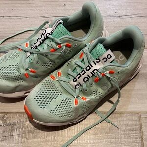 On Cloud Surfer Mint Green Running Shoe with Orange Accent